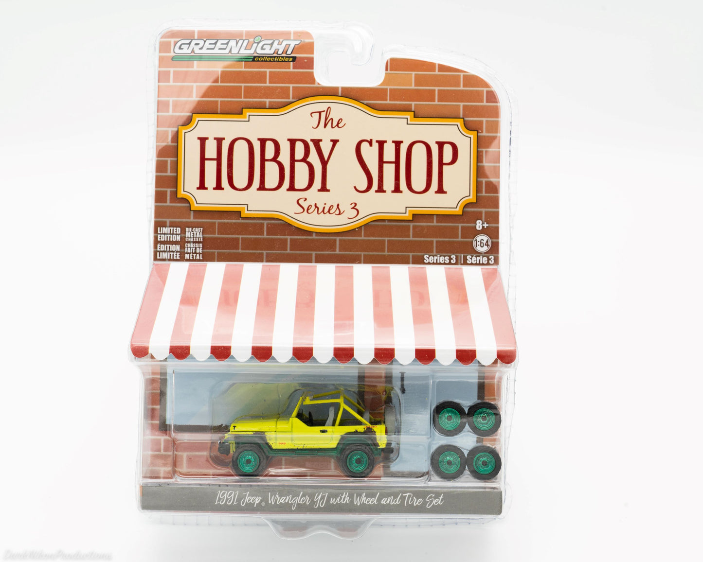 1991 Jeep Wrangler YJ yellow chase car with bonus wheel and tire set - Greenlight Hobby Shop Series 3 in brick storefront packaging