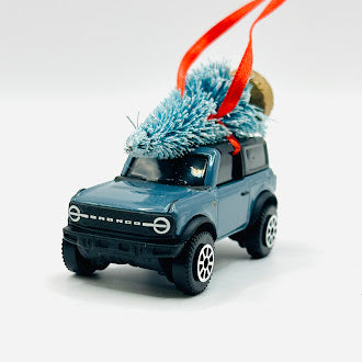 Front view of Ford Bronco 2021 diecast ornament with tree