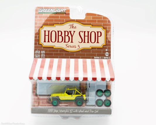 1991 Jeep Wrangler YJ yellow chase car with bonus wheel and tire set - Greenlight Hobby Shop Series 3 in brick storefront packaging — Offroad Collectibles.