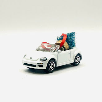 Angle front side of white Beetle car convertible ornament offroad collectibles