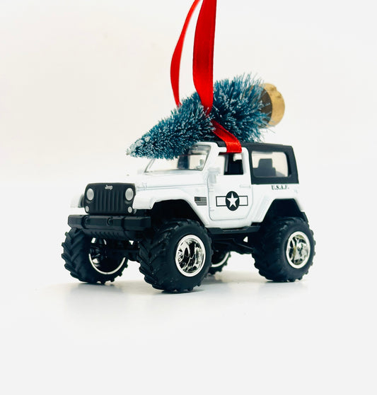 White Jeep Wrangler JK 2-door U.S.A.F. Air Force ornament with Christmas tree and red ribbon - front angle view