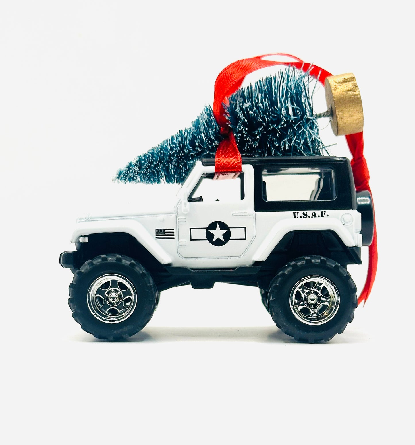 White Jeep Wrangler JK 2-door diecast ornament with U.S.A.F. Air Force star insignia, American flag, and Christmas tree - side view