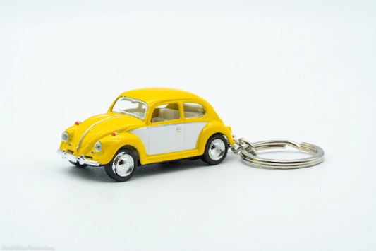 Yellow and white VW Beetle diecast keychain with metal keyring